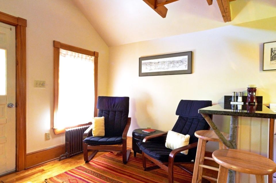 This old-time shingled cottage in Maine oozes charm. It has an open studio layout plus a sleeping loft. | www.facebook.com/SmallHouseBliss