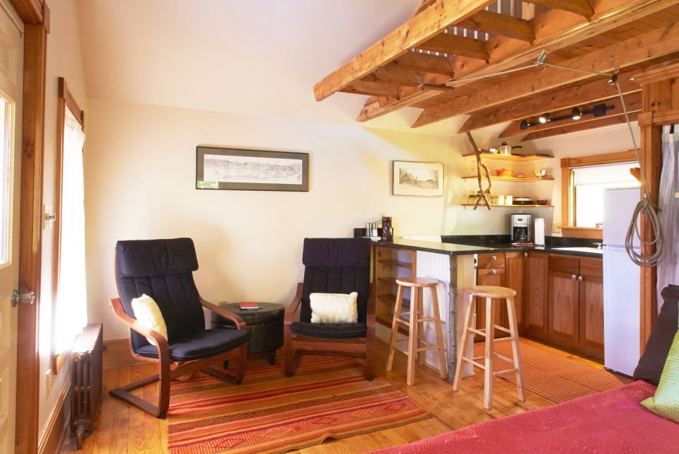 This old-time shingled cottage in Maine oozes charm. It has an open studio layout plus a sleeping loft. | www.facebook.com/SmallHouseBliss