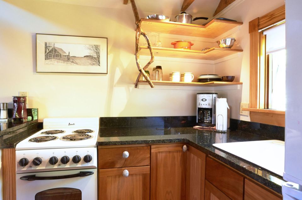 This old-time shingled cottage in Maine oozes charm. It has an open studio layout plus a sleeping loft. | www.facebook.com/SmallHouseBliss