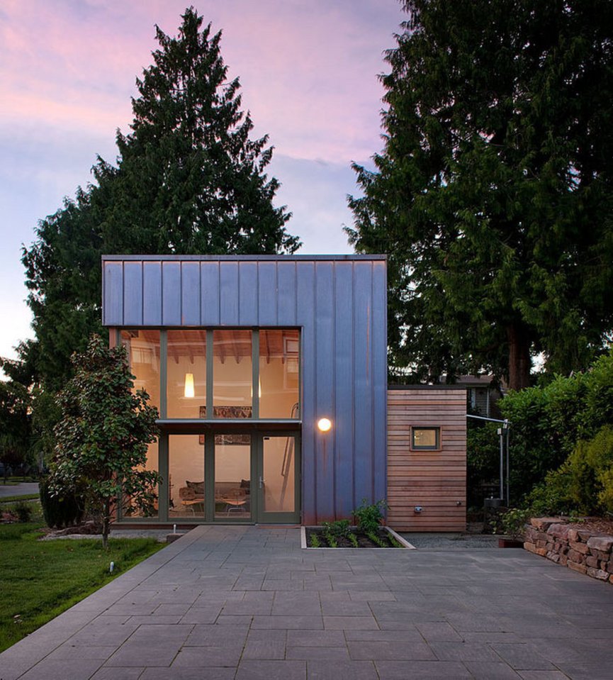 This copper, glass and cedar "garden pavilion" serves as guest house, music studio and home office. The 350 sq ft structure includes a full bathroom and a kitchenette. | www.facebook.com/SmallHouseBliss