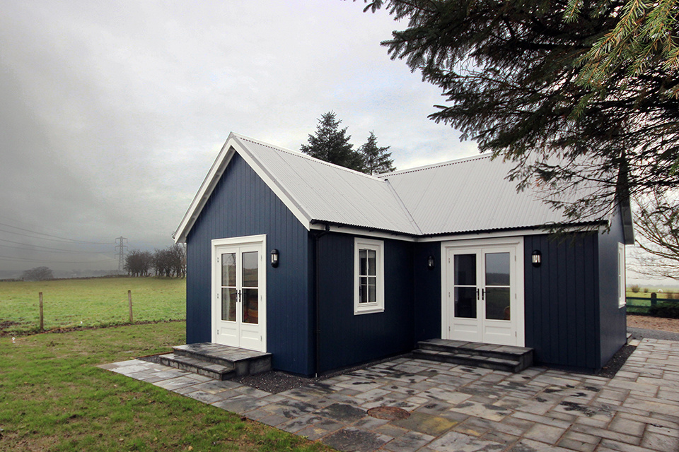 A small traditionally-styled Scottish house by modular builder The Wee House Company. This model has one bedroom in 431 sq ft. | www.facebook.com/SmallHouseBliss