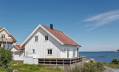 This traditional style family vacation cottage sits on a rugged island on Sweden's west coast. It has three bedrooms in 1,087 sq ft. | www.facebook.com/SmallHouseBliss