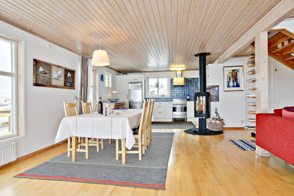 This traditional style family vacation cottage sits on a rugged island on Sweden's west coast. It has three bedrooms in 1,087 sq ft. | www.facebook.com/SmallHouseBliss