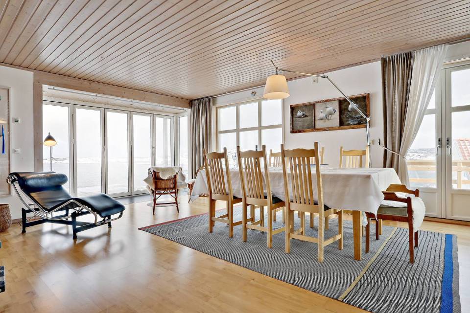 This traditional style family vacation cottage sits on a rugged island on Sweden's west coast. It has three bedrooms in 1,087 sq ft. | www.facebook.com/SmallHouseBliss