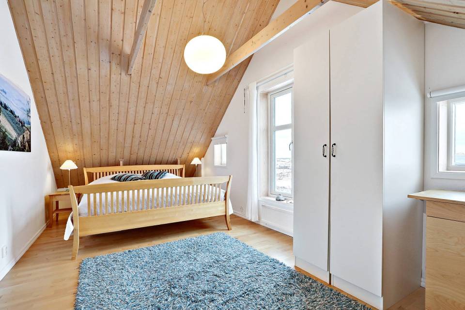 This traditional style family vacation cottage sits on a rugged island on Sweden's west coast. It has three bedrooms in 1,087 sq ft. | www.facebook.com/SmallHouseBliss