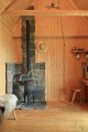 This tiny log cabin provides a snug and romantic retreat for couples. | www.facebook.com/SmallHouseBliss