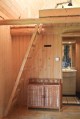 This tiny log cabin provides a snug and romantic retreat for couples. | www.facebook.com/SmallHouseBliss
