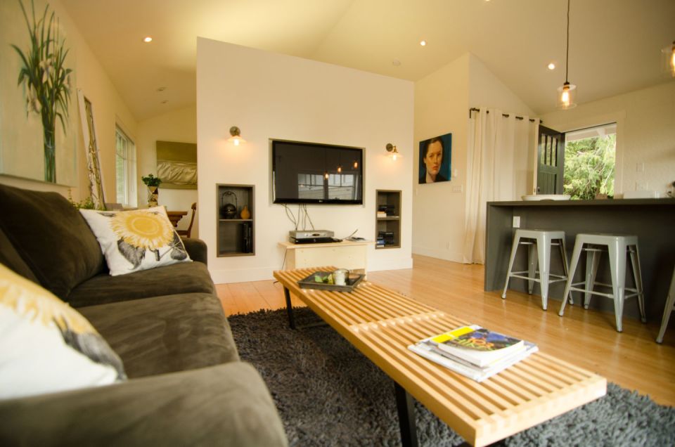 This contemporary coastal cottage has an open floor plan with one bedroom in 600 sq ft. | www.facebook.com/SmallHouseBliss
