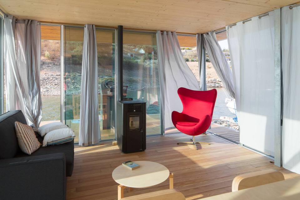 Floatwing, a line of houseboats that can be equipped for autonomous off-grid living. This one has one bedroom in 561 sq ft. | www.facebook.com/SmallHouseBliss