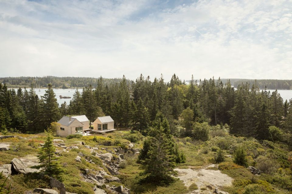 A trio of tiny cabins forms a seasonal vacation retreat in an old quarry. One cabin is the living/dining/kitchen pavilion, the other two are sleeping cabins. | www.facebook.com/SmallHouseBliss