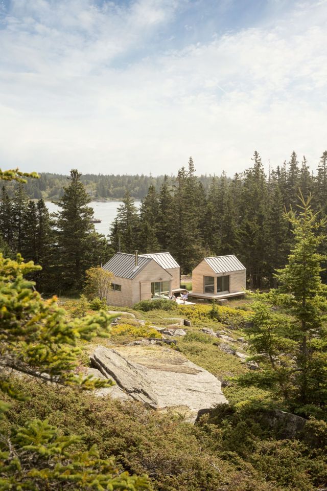 A trio of tiny cabins forms a seasonal vacation retreat in an old quarry. One cabin is the living/dining/kitchen pavilion, the other two are sleeping cabins. | www.facebook.com/SmallHouseBliss