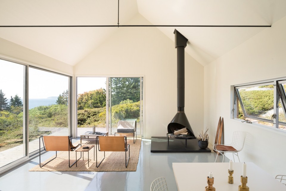 A trio of tiny cabins forms a seasonal vacation retreat in an old quarry. One cabin is the living/dining/kitchen pavilion, the other two are sleeping cabins. | www.facebook.com/SmallHouseBliss