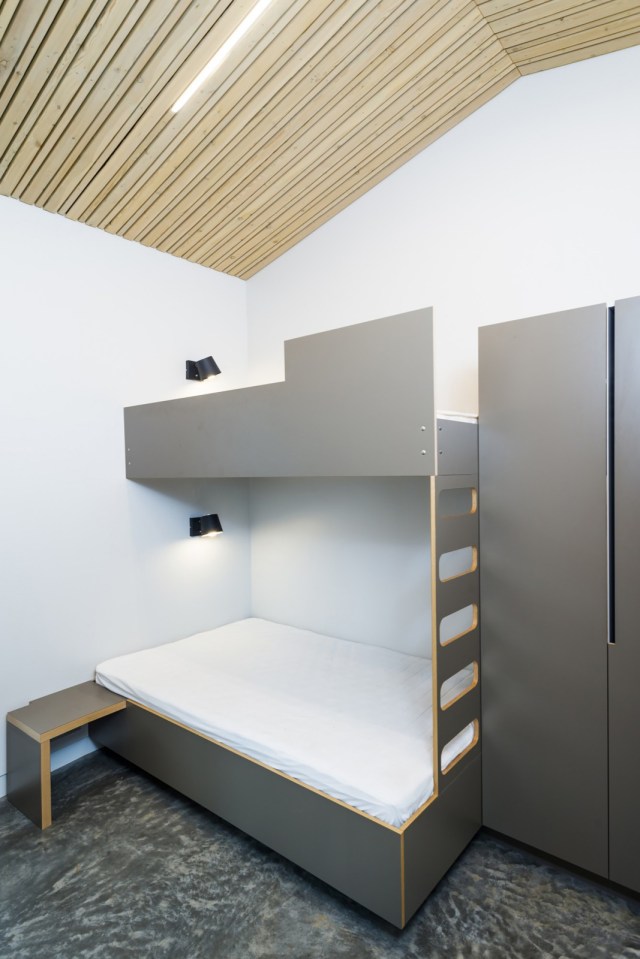 A modern version of the traditional Icelandic turf house, this vacation home blends into the landscape. It has three bedrooms in 1,109 sq ft. | www.facebook.com/SmallHouseBliss