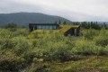 A modern version of the traditional Icelandic turf house, this vacation home blends into the landscape. It has three bedrooms in 1,109 sq ft. | www.facebook.com/SmallHouseBliss
