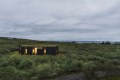 A modern version of the traditional Icelandic turf house, this vacation home blends into the landscape. It has three bedrooms in 1,109 sq ft. | www.facebook.com/SmallHouseBliss