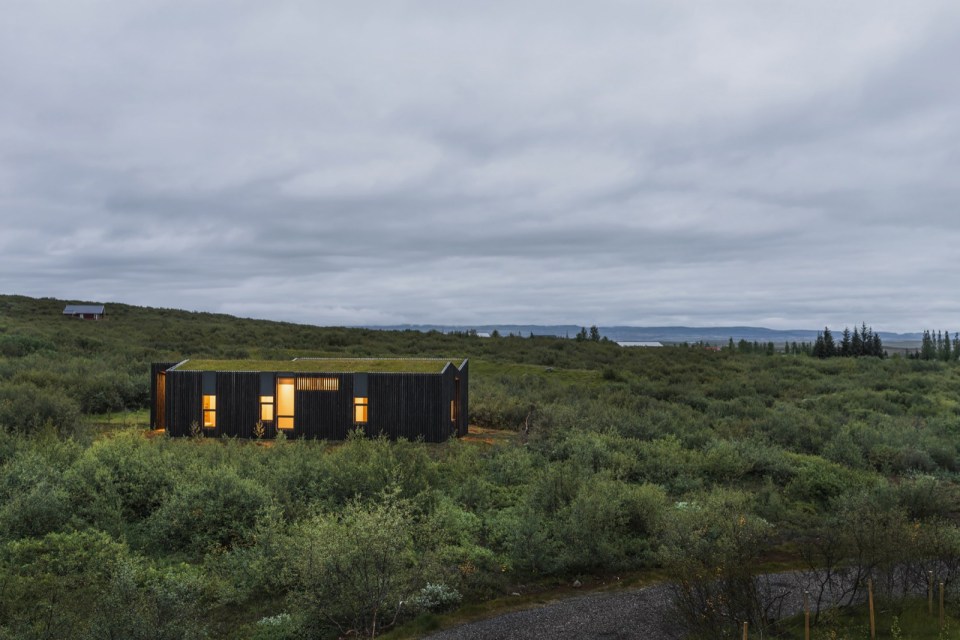 A modern version of the traditional Icelandic turf house, this vacation home blends into the landscape. It has three bedrooms in 1,109 sq ft. | www.facebook.com/SmallHouseBliss
