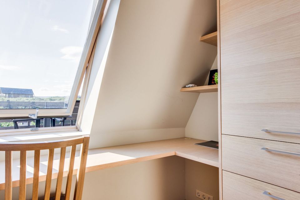 Iceland's volcanoes were the inspiration for this stunning pyramid-shaped vacation cottage. It has three small bedrooms plus a loft. | www.facebook.com/SmallHouseBliss