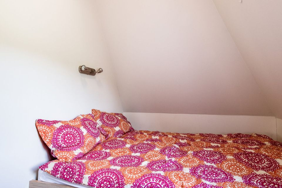 Iceland's volcanoes were the inspiration for this stunning pyramid-shaped vacation cottage. It has three small bedrooms plus a loft. | www.facebook.com/SmallHouseBliss