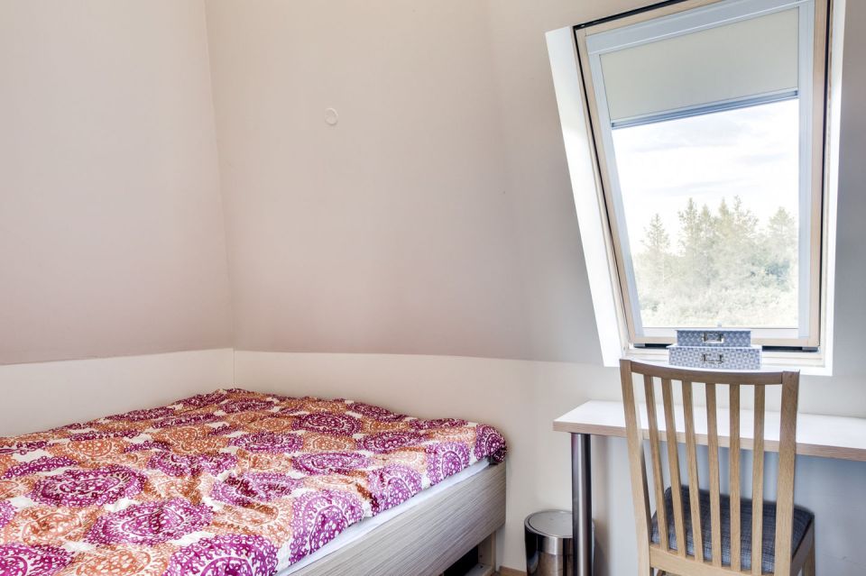 Iceland's volcanoes were the inspiration for this stunning pyramid-shaped vacation cottage. It has three small bedrooms plus a loft. | www.facebook.com/SmallHouseBliss