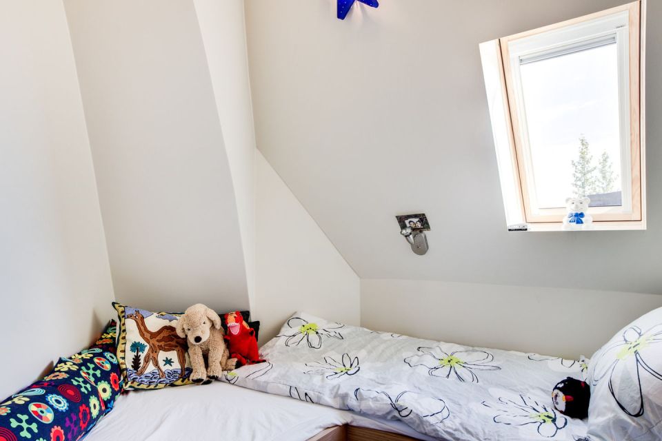 Iceland's volcanoes were the inspiration for this stunning pyramid-shaped vacation cottage. It has three small bedrooms plus a loft. | www.facebook.com/SmallHouseBliss