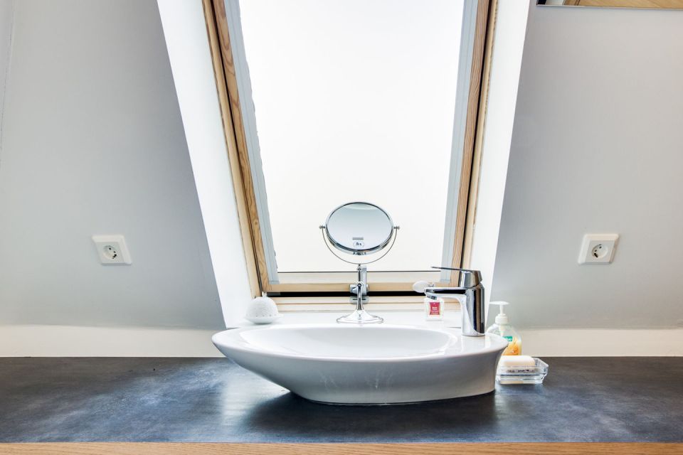 Iceland's volcanoes were the inspiration for this stunning pyramid-shaped vacation cottage. It has three small bedrooms plus a loft. | www.facebook.com/SmallHouseBliss