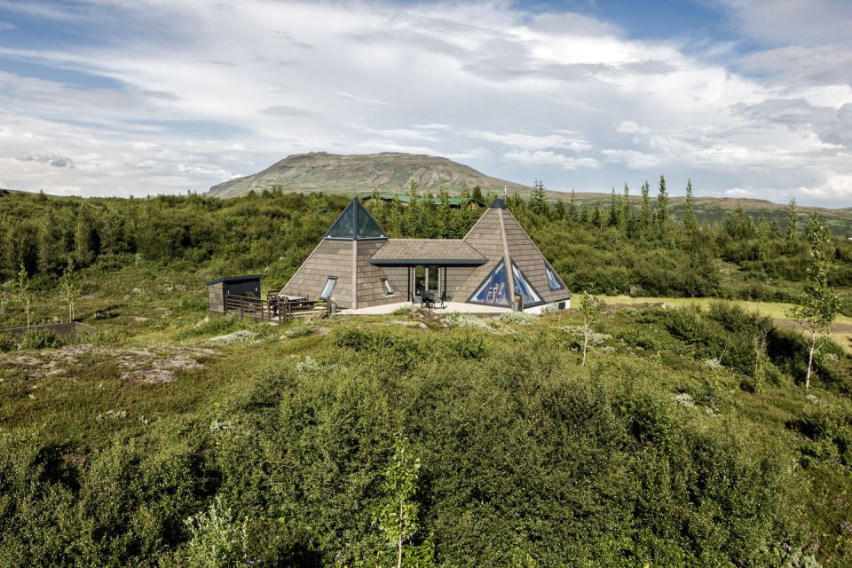 Iceland's volcanoes were the inspiration for this stunning pyramid-shaped vacation cottage. It has three small bedrooms plus a loft. | www.facebook.com/SmallHouseBliss