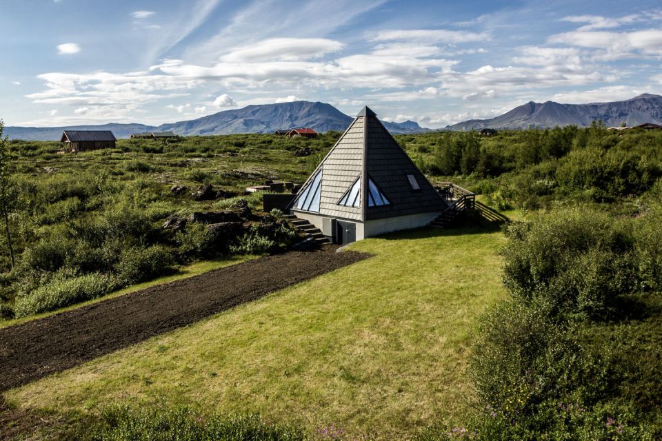 Iceland's volcanoes were the inspiration for this stunning pyramid-shaped vacation cottage. It has three small bedrooms plus a loft. | www.facebook.com/SmallHouseBliss