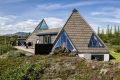 Iceland's volcanoes were the inspiration for this stunning pyramid-shaped vacation cottage. It has three small bedrooms plus a loft. | www.facebook.com/SmallHouseBliss