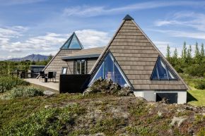 Iceland's volcanoes were the inspiration for this stunning pyramid-shaped vacation cottage. It has three small bedrooms plus a loft. | www.facebook.com/SmallHouseBliss