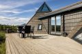 Iceland's volcanoes were the inspiration for this stunning pyramid-shaped vacation cottage. It has three small bedrooms plus a loft. | www.facebook.com/SmallHouseBliss
