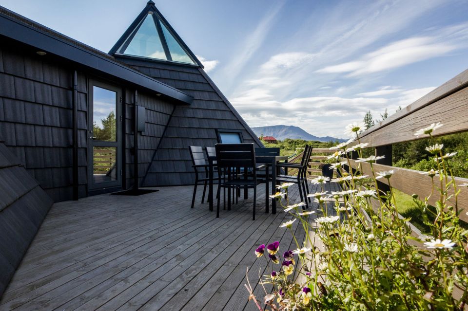 Iceland's volcanoes were the inspiration for this stunning pyramid-shaped vacation cottage. It has three small bedrooms plus a loft. | www.facebook.com/SmallHouseBliss