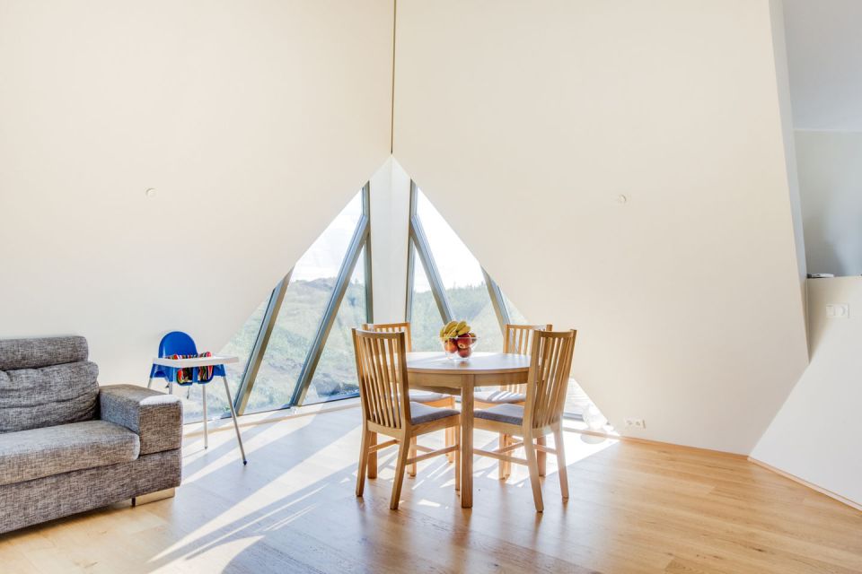 Iceland's volcanoes were the inspiration for this stunning pyramid-shaped vacation cottage. It has three small bedrooms plus a loft. | www.facebook.com/SmallHouseBliss