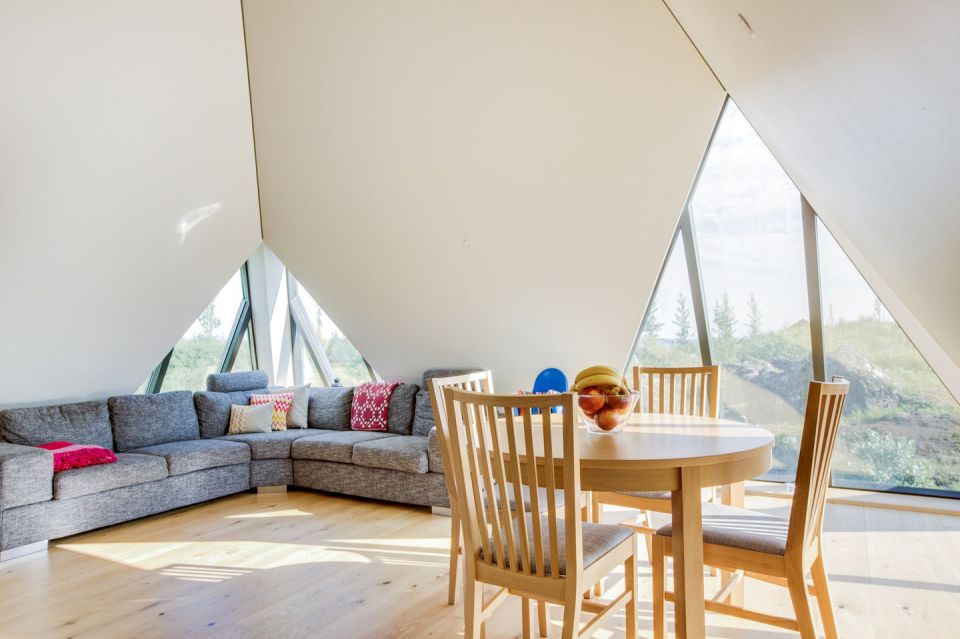 Iceland's volcanoes were the inspiration for this stunning pyramid-shaped vacation cottage. It has three small bedrooms plus a loft. | www.facebook.com/SmallHouseBliss