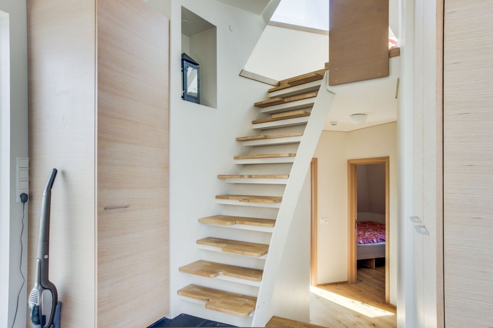 Iceland's volcanoes were the inspiration for this stunning pyramid-shaped vacation cottage. It has three small bedrooms plus a loft. | www.facebook.com/SmallHouseBliss