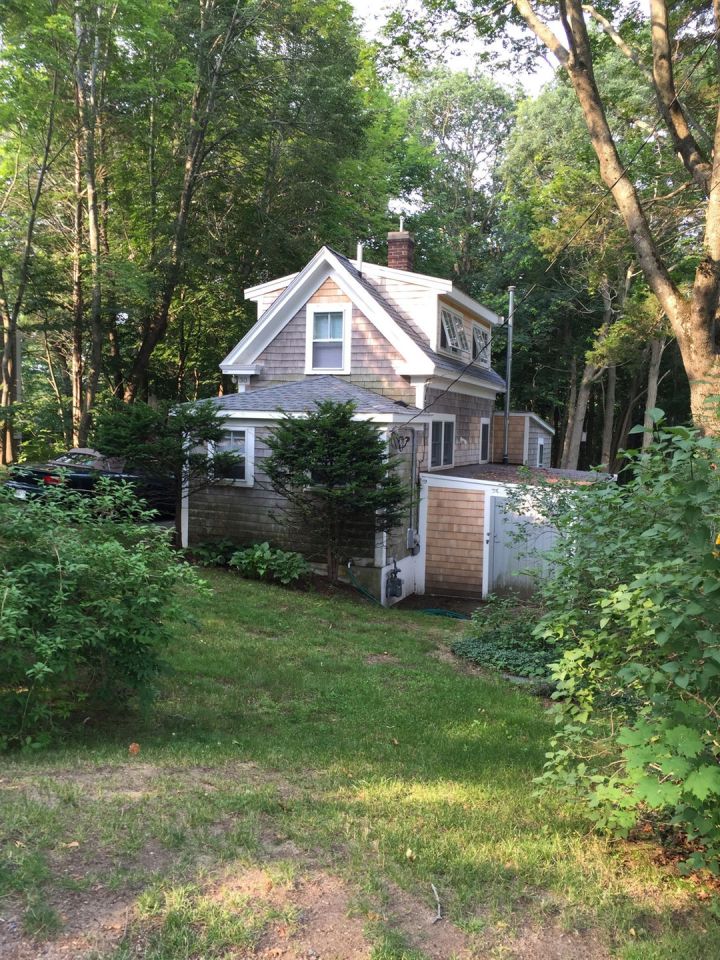 A tiny "half Cape" cottage on Cape Cod Bay. Its interior was updated in keeping with the age and character of the cottage. | www.facebook.com/SmallHouseBliss