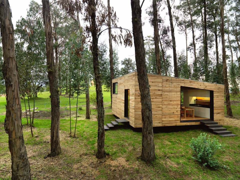 A small house in Ecuador built with sustainable materials and a green roof. It has one bedroom in 524 sq ft. | www.facebook.com/SmallHouseBliss