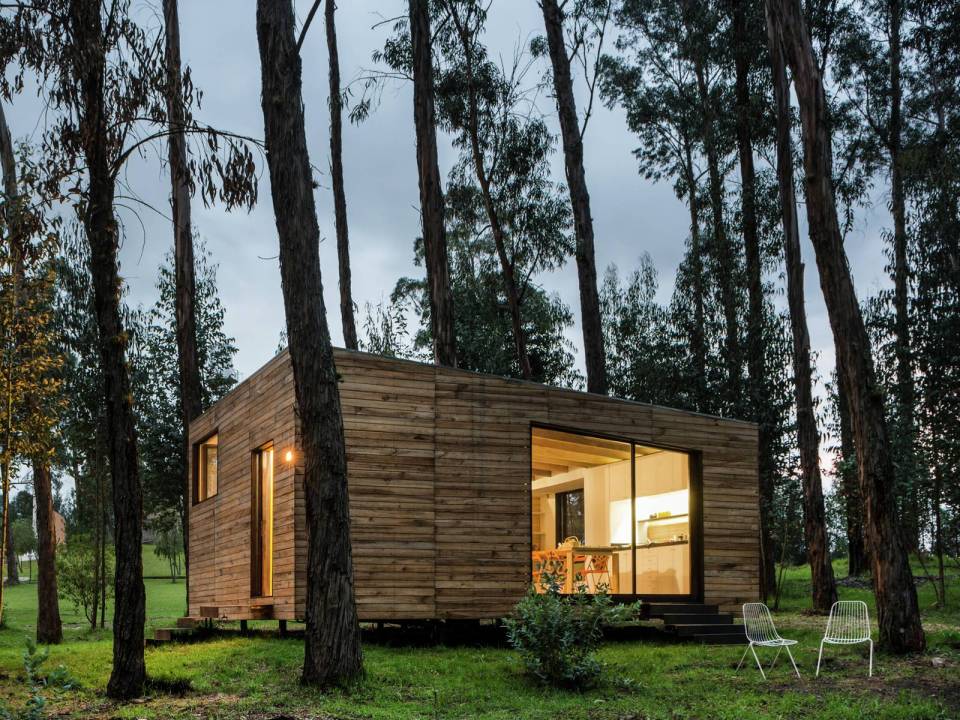 A small house in Ecuador built with sustainable materials and a green roof. It has one bedroom in 524 sq ft. | www.facebook.com/SmallHouseBliss