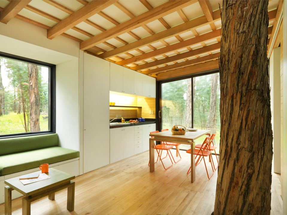 A small house in Ecuador built with sustainable materials and a green roof. It has one bedroom in 524 sq ft. | www.facebook.com/SmallHouseBliss