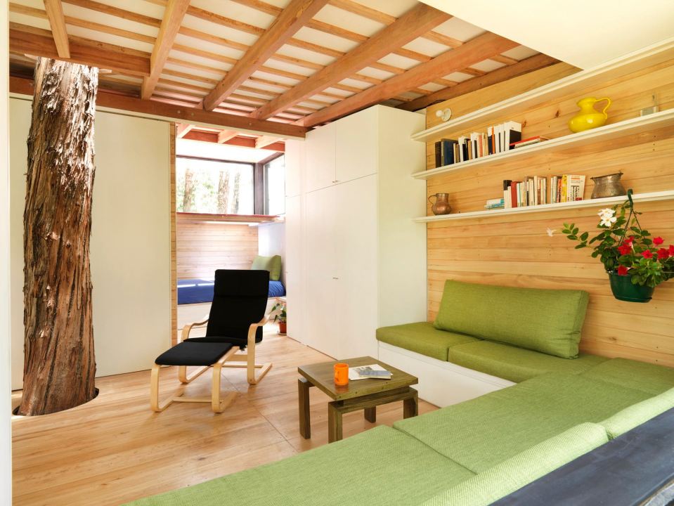 A small house in Ecuador built with sustainable materials and a green roof. It has one bedroom in 524 sq ft. | www.facebook.com/SmallHouseBliss