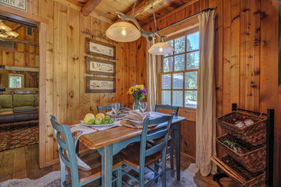 Built in the 1920s, Wildflower Cabin is loaded with vintage charm. It has one bedroom and a loft in 600 sq ft. | www.facebook.com/SmallHouseBliss