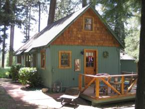 Built in the 1920s, Wildflower Cabin is loaded with vintage charm. It has one bedroom and a loft in 600 sq ft. | www.facebook.com/SmallHouseBliss