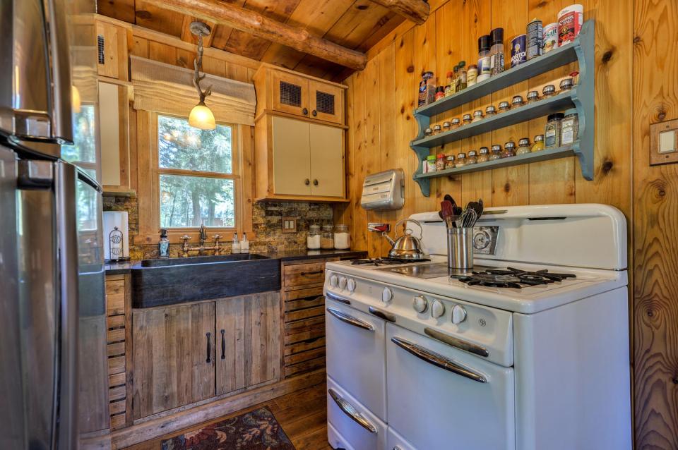 Built in the 1920s, Wildflower Cabin is loaded with vintage charm. It has one bedroom and a loft in 600 sq ft. | www.facebook.com/SmallHouseBliss