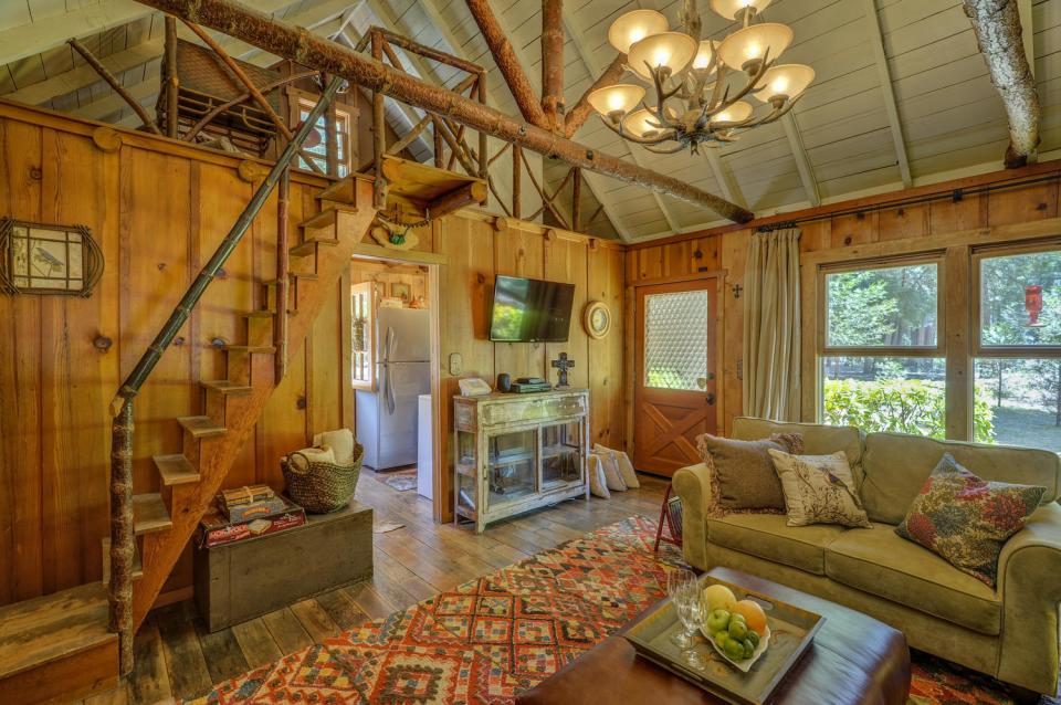 Built in the 1920s, Wildflower Cabin is loaded with vintage charm. It has one bedroom and a loft in 600 sq ft. | www.facebook.com/SmallHouseBliss