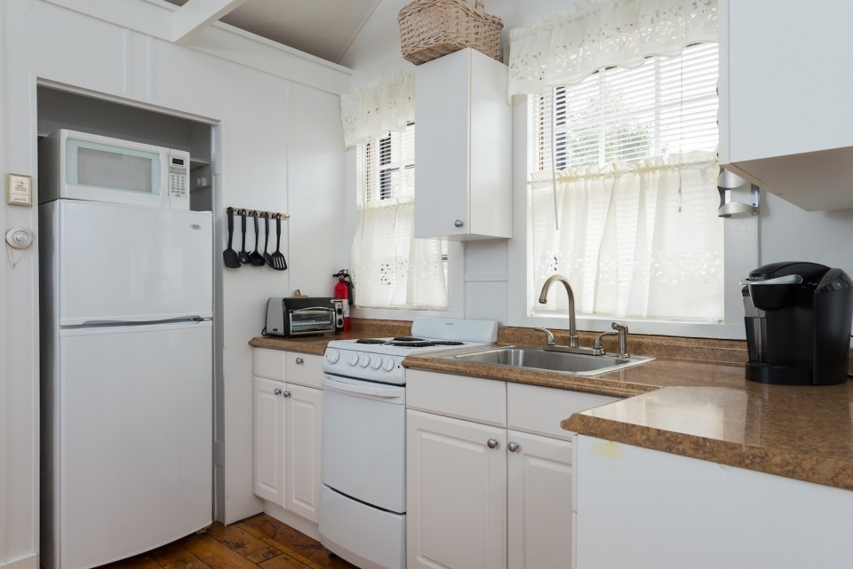 This tiny cottage on Cape Cod was once used as a children's playhouse before being converted into a studio dwelling with 348 sq ft. | www.facebook.com/SmallHouseBliss