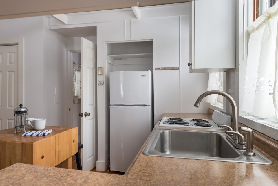 This tiny cottage on Cape Cod was once used as a children's playhouse before being converted into a studio dwelling with 348 sq ft. | www.facebook.com/SmallHouseBliss