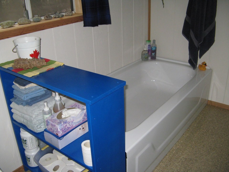 An off-grid floating cabin on Powell Lake, British Columbia. Built on a raft of cedar logs, the 675 sq ft cabin has 2 small bedrooms and a loft. | www.facebook.com/SmallHouseBliss