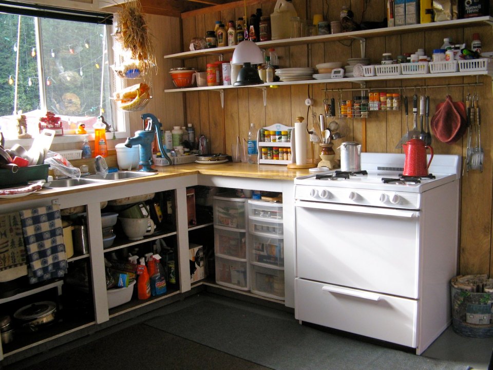 An off-grid floating cabin on Powell Lake, British Columbia. Built on a raft of cedar logs, the 675 sq ft cabin has 2 small bedrooms and a loft. | www.facebook.com/SmallHouseBliss