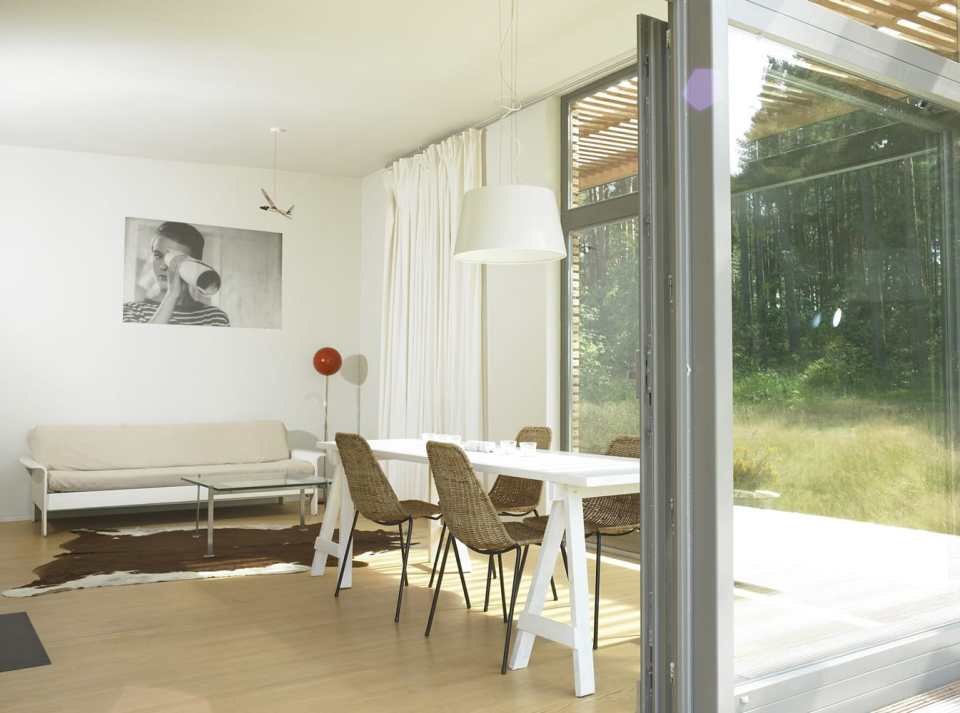 Inspired by Scandinavian summerhouse culture, Sommerhaus PIU is a clean-lined prefab vacation home with two bedrooms in 700 sq ft. | www.facebook.com/SmallHouseBliss