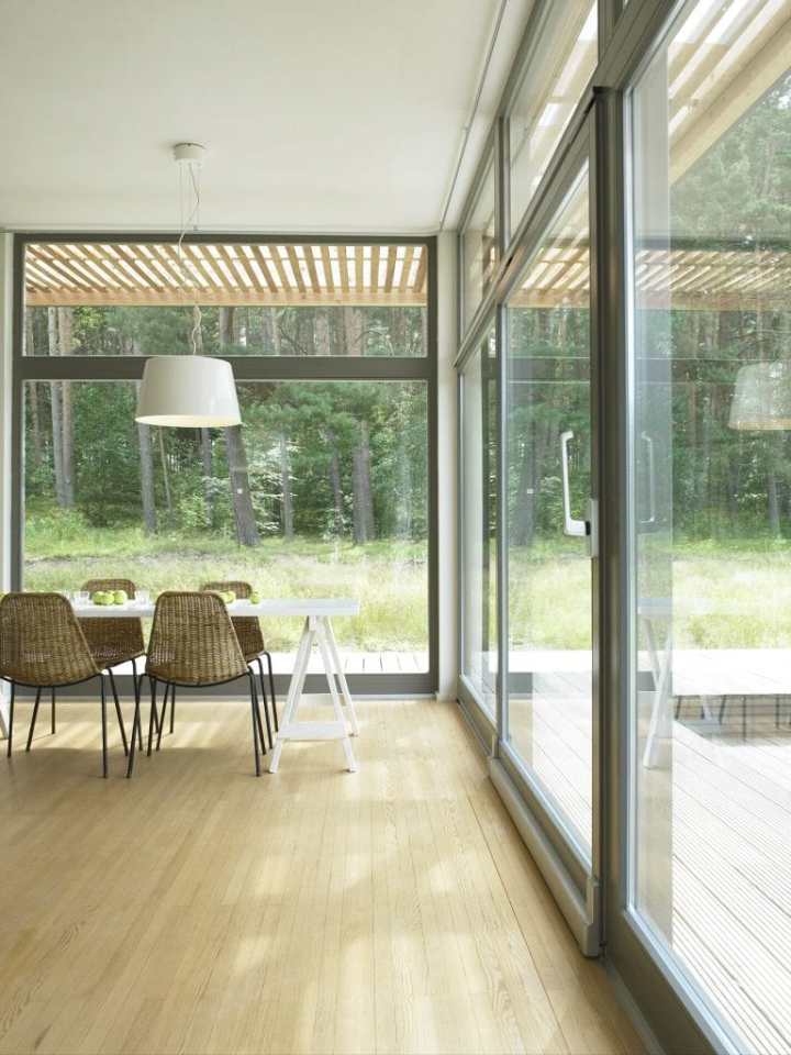 Inspired by Scandinavian summerhouse culture, Sommerhaus PIU is a clean-lined prefab vacation home with two bedrooms in 700 sq ft. | www.facebook.com/SmallHouseBliss