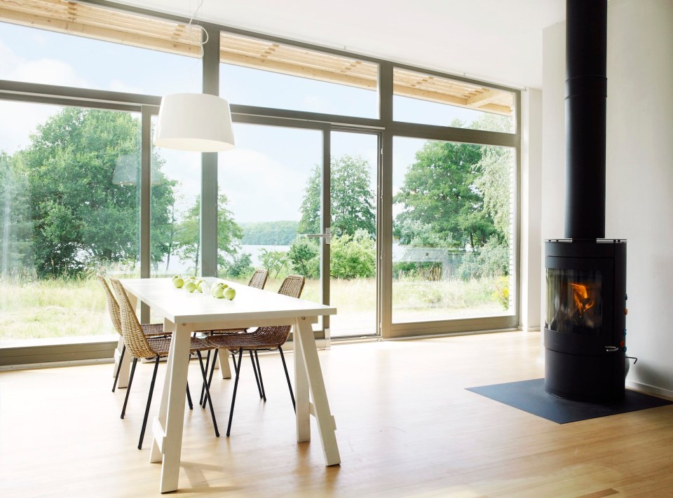 Inspired by Scandinavian summerhouse culture, Sommerhaus PIU is a clean-lined prefab vacation home with two bedrooms in 700 sq ft. | www.facebook.com/SmallHouseBliss